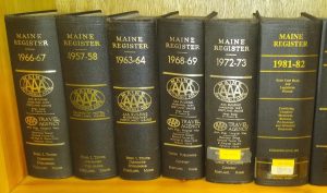 Photo of several Maine Registers on a shelf.