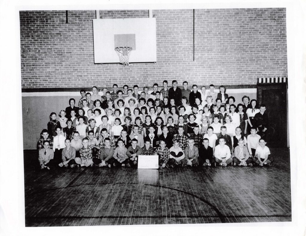 Photo of the 1954 6th grade class at Bessey School, Scarborough, Maine.
