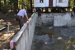 Chris-Carland-is-putting-down-pressure-treated-sill-plates